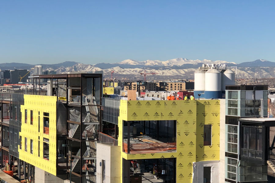 Construction picture of a job site in Denver, Colorado | Improve your change order process | Knowify