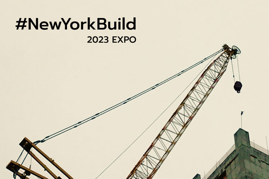 Construction picture of a crane moving to the top of a building with messaging reading: '#NewYorkBuild 2023 Expo' | Knowify