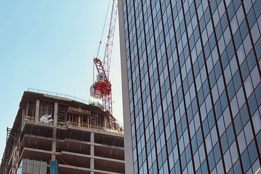 Picture of a construction site in Vancouver | How to add sales tax to AIA billing | Knowify